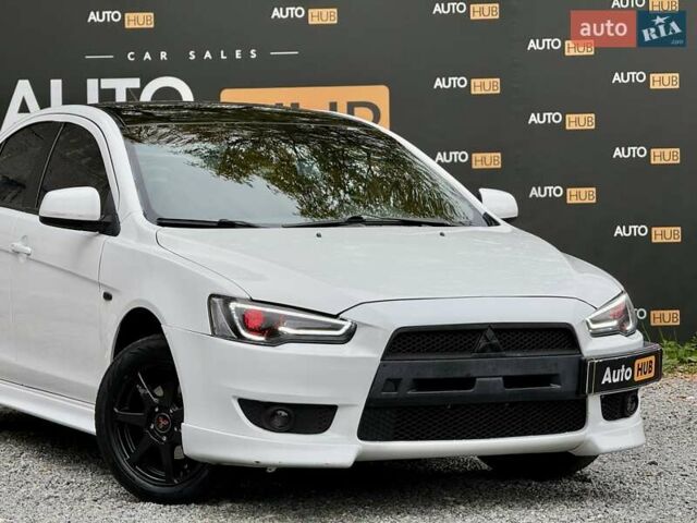 Білий Міцубісі Lancer, об'ємом двигуна 2 л та пробігом 170 тис. км за 6900 $, фото 3 на Automoto.ua