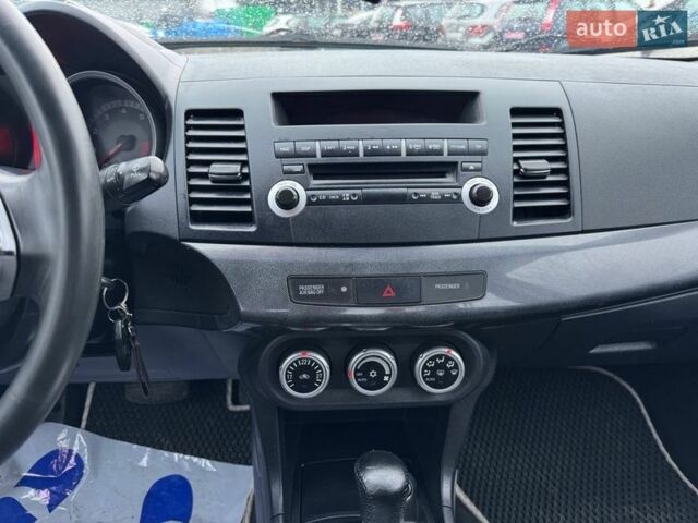 Белый Мицубиси Лансер, объемом двигателя 2 л и пробегом 260 тыс. км за 6700 $, фото 10 на Automoto.ua