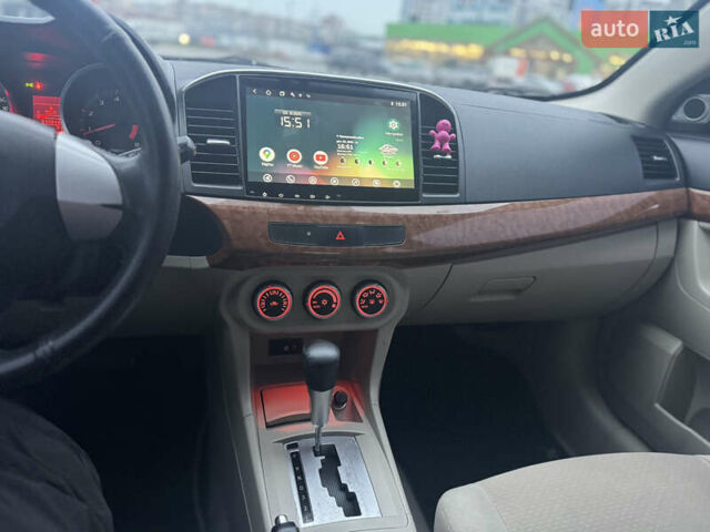 Белый Мицубиси Лансер, объемом двигателя 1.5 л и пробегом 314 тыс. км за 6500 $, фото 24 на Automoto.ua