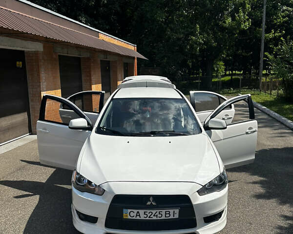 Білий Міцубісі Lancer, об'ємом двигуна 2 л та пробігом 121 тис. км за 8000 $, фото 6 на Automoto.ua