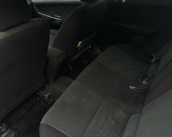 Белый Мицубиси Лансер, объемом двигателя 1.47 л и пробегом 230 тыс. км за 5800 $, фото 20 на Automoto.ua