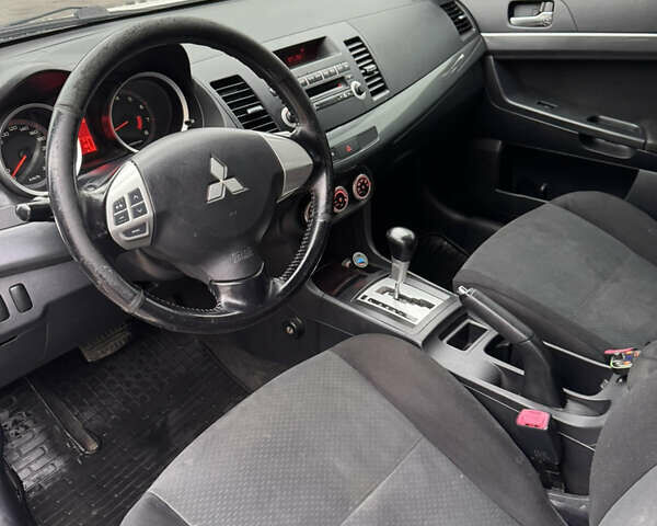 Белый Мицубиси Лансер, объемом двигателя 1.47 л и пробегом 230 тыс. км за 5800 $, фото 21 на Automoto.ua