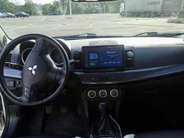 Білий Міцубісі Lancer, об'ємом двигуна 2 л та пробігом 270 тис. км за 5200 $, фото 12 на Automoto.ua
