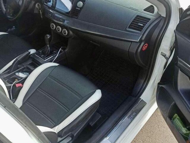 Білий Міцубісі Lancer, об'ємом двигуна 2 л та пробігом 270 тис. км за 5200 $, фото 13 на Automoto.ua