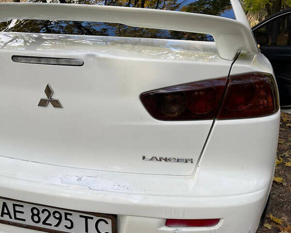 Міцубісі Lancer 2008 у Дніпро (Дніпропетровську) на Automoto.ua Білий Міцубісі Lancer, об'ємом двигуна 2 л та пробігом 200 тис. км за 4000 $, фото 2 на Automoto.ua