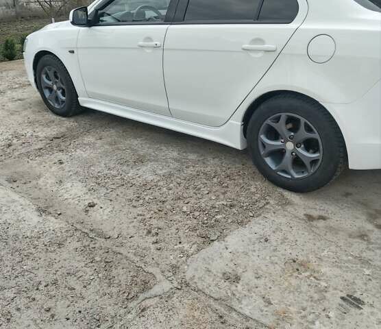 Білий Міцубісі Lancer, об'ємом двигуна 2 л та пробігом 287 тис. км за 6000 $, фото 2 на Automoto.ua