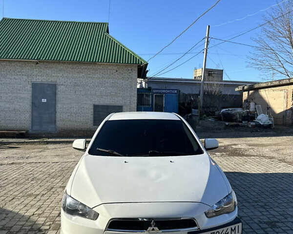 Белый Мицубиси Лансер, объемом двигателя 1.5 л и пробегом 255 тыс. км за 5777 $, фото 3 на Automoto.ua
