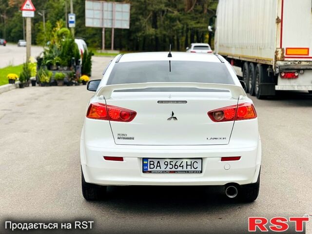 Белый Мицубиси Лансер, объемом двигателя 2 л и пробегом 185 тыс. км за 7999 $, фото 4 на Automoto.ua