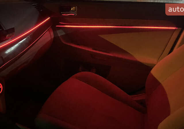 Белый Мицубиси Лансер, объемом двигателя 2 л и пробегом 220 тыс. км за 6000 $, фото 16 на Automoto.ua