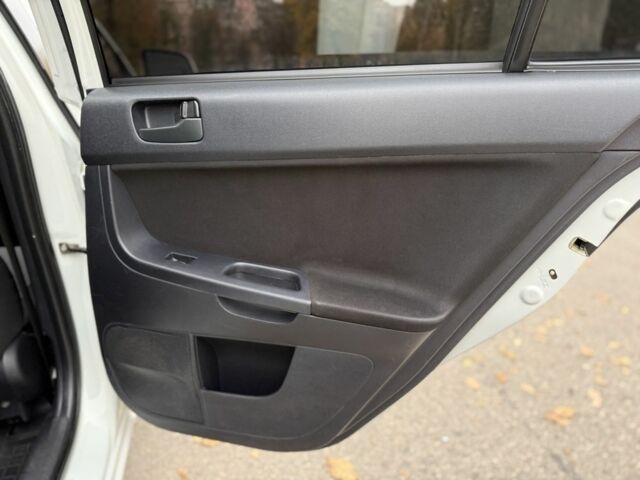 Белый Мицубиси Лансер, объемом двигателя 1.5 л и пробегом 265 тыс. км за 5600 $, фото 23 на Automoto.ua