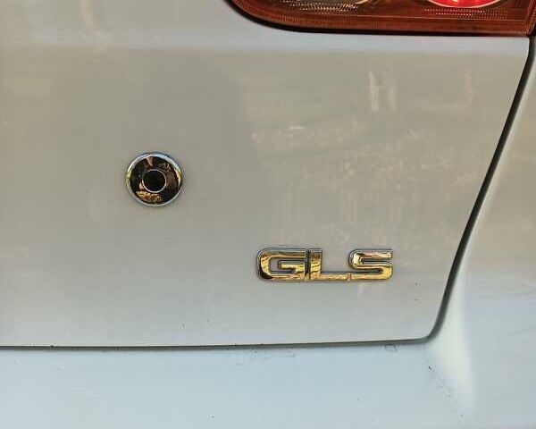 Білий Міцубісі Lancer, об'ємом двигуна 1.5 л та пробігом 221 тис. км за 6800 $, фото 6 на Automoto.ua