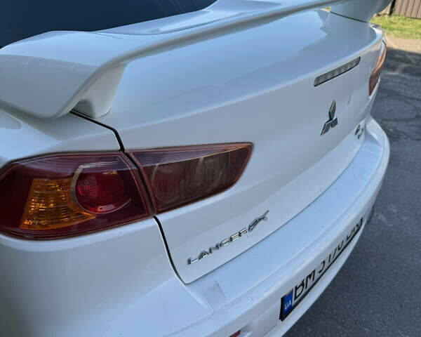 Белый Мицубиси Лансер, объемом двигателя 1.47 л и пробегом 230 тыс. км за 5800 $, фото 16 на Automoto.ua