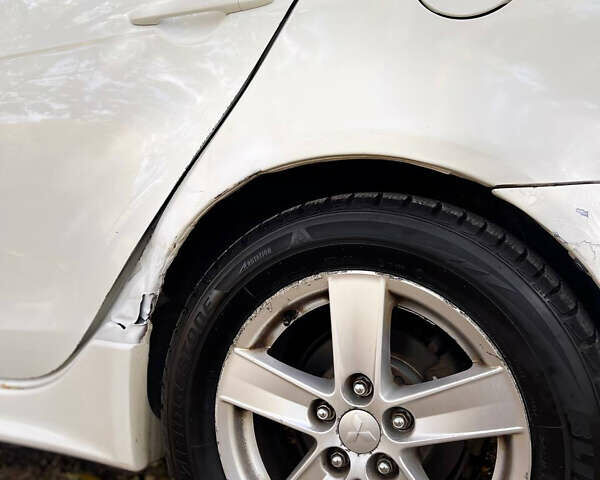 Міцубісі Lancer 2008 у Дніпро (Дніпропетровську) на Automoto.ua Білий Міцубісі Lancer, об'ємом двигуна 2 л та пробігом 200 тис. км за 4000 $, фото 12 на Automoto.ua