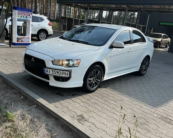 Білий Міцубісі Lancer, об'ємом двигуна 2 л та пробігом 277 тис. км за 7000 $, фото 2 на Automoto.ua