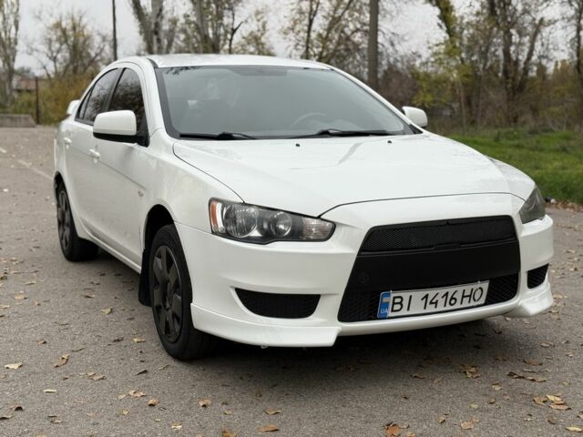 Белый Мицубиси Лансер, объемом двигателя 1.5 л и пробегом 265 тыс. км за 5600 $, фото 21 на Automoto.ua