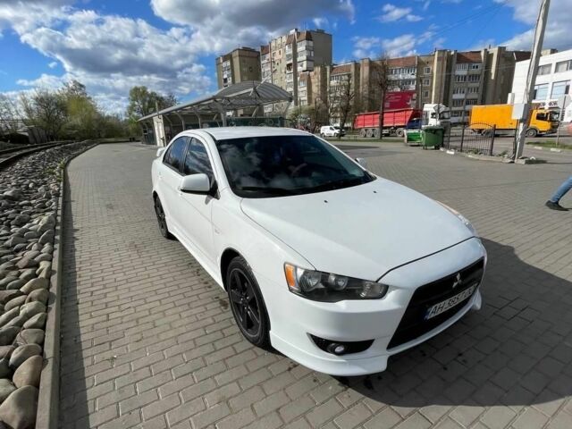 Білий Міцубісі Lancer, об'ємом двигуна 2 л та пробігом 182 тис. км за 7400 $, фото 12 на Automoto.ua