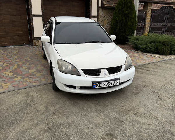 Белый Мицубиси Лансер, объемом двигателя 1.58 л и пробегом 285 тыс. км за 3500 $, фото 7 на Automoto.ua