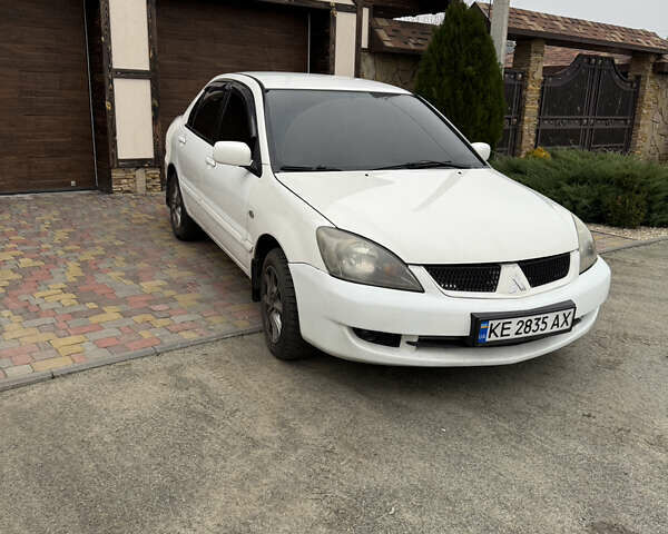 Белый Мицубиси Лансер, объемом двигателя 1.58 л и пробегом 285 тыс. км за 3500 $, фото 6 на Automoto.ua