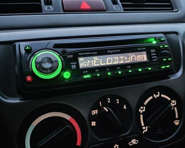 Белый Мицубиси Лансер, объемом двигателя 1.6 л и пробегом 59 тыс. км за 6700 $, фото 48 на Automoto.ua