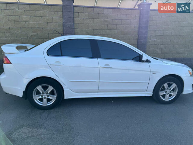 Белый Мицубиси Лансер, объемом двигателя 1.47 л и пробегом 230 тыс. км за 5800 $, фото 6 на Automoto.ua