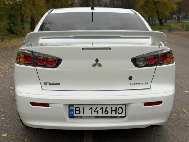 Белый Мицубиси Лансер, объемом двигателя 1.5 л и пробегом 265 тыс. км за 5600 $, фото 20 на Automoto.ua