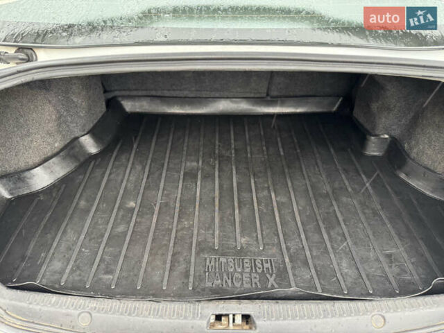 Белый Мицубиси Лансер, объемом двигателя 1.47 л и пробегом 230 тыс. км за 5800 $, фото 22 на Automoto.ua