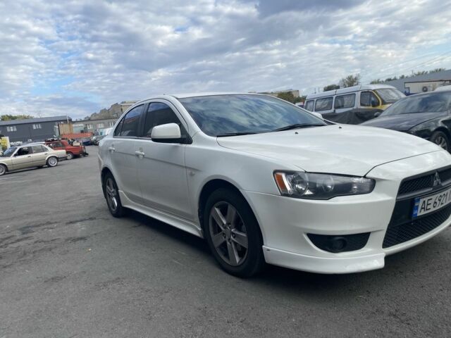 Білий Міцубісі Lancer, об'ємом двигуна 2 л та пробігом 3 тис. км за 6500 $, фото 6 на Automoto.ua