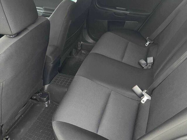 Білий Міцубісі Lancer, об'ємом двигуна 2 л та пробігом 190 тис. км за 7500 $, фото 9 на Automoto.ua