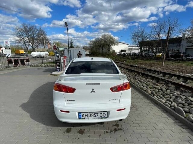 Білий Міцубісі Lancer, об'ємом двигуна 2 л та пробігом 182 тис. км за 7600 $, фото 9 на Automoto.ua