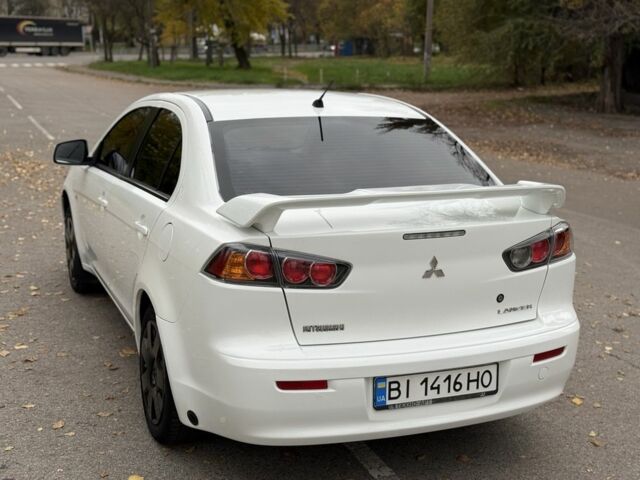 Белый Мицубиси Лансер, объемом двигателя 1.5 л и пробегом 265 тыс. км за 5600 $, фото 2 на Automoto.ua