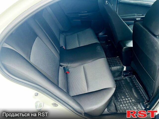 Белый Мицубиси Лансер, объемом двигателя 2 л и пробегом 185 тыс. км за 7999 $, фото 8 на Automoto.ua