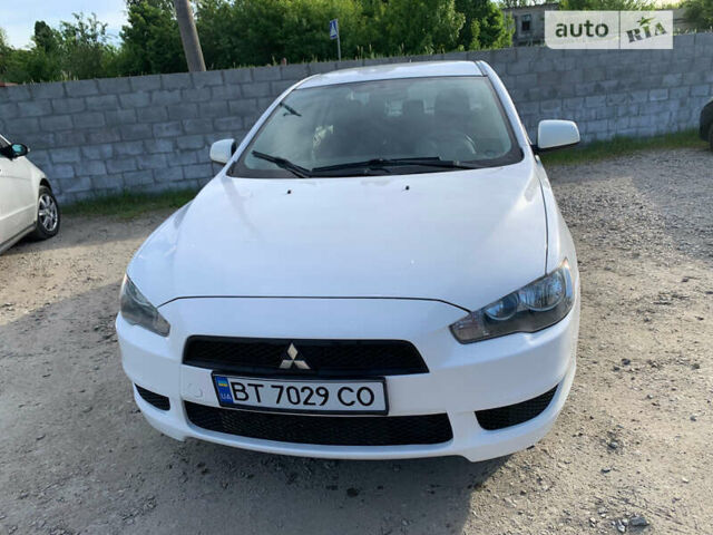 Білий Міцубісі Lancer, об'ємом двигуна 1.5 л та пробігом 206 тис. км за 6500 $, фото 1 на Automoto.ua