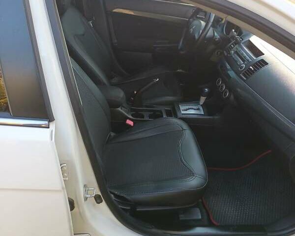 Білий Міцубісі Lancer, об'ємом двигуна 1.5 л та пробігом 221 тис. км за 6800 $, фото 10 на Automoto.ua