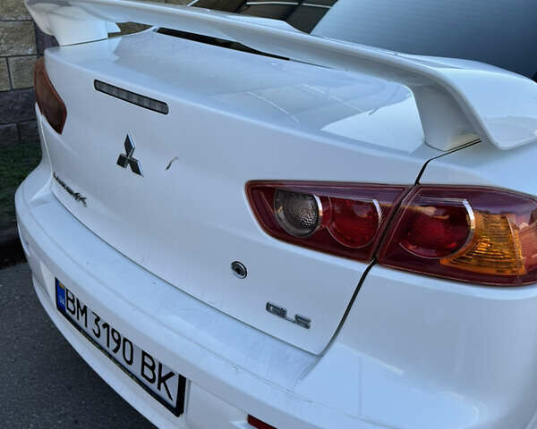 Белый Мицубиси Лансер, объемом двигателя 1.47 л и пробегом 230 тыс. км за 5800 $, фото 17 на Automoto.ua