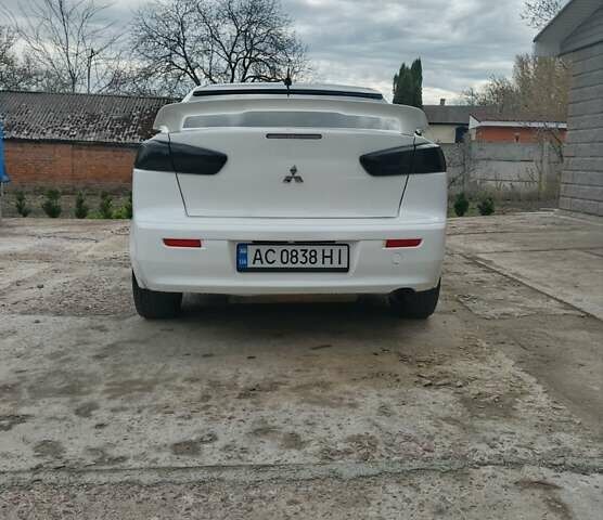 Білий Міцубісі Lancer, об'ємом двигуна 2 л та пробігом 287 тис. км за 6000 $, фото 6 на Automoto.ua