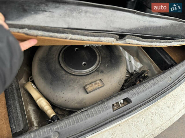 Белый Мицубиси Лансер, объемом двигателя 1.47 л и пробегом 230 тыс. км за 5800 $, фото 23 на Automoto.ua