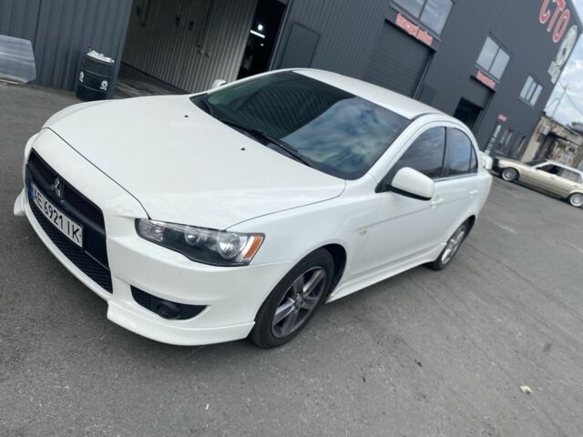 Білий Міцубісі Lancer, об'ємом двигуна 2 л та пробігом 3 тис. км за 6500 $, фото 8 на Automoto.ua