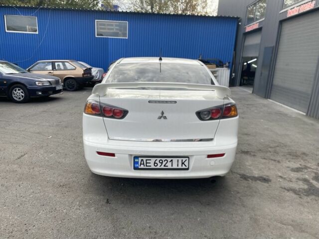 Білий Міцубісі Lancer, об'ємом двигуна 2 л та пробігом 3 тис. км за 6500 $, фото 2 на Automoto.ua