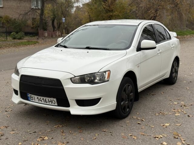 Белый Мицубиси Лансер, объемом двигателя 1.5 л и пробегом 265 тыс. км за 5600 $, фото 1 на Automoto.ua