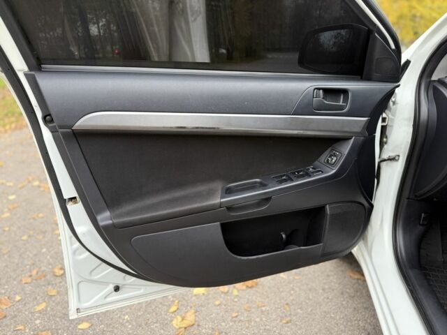 Белый Мицубиси Лансер, объемом двигателя 1.5 л и пробегом 265 тыс. км за 5600 $, фото 19 на Automoto.ua