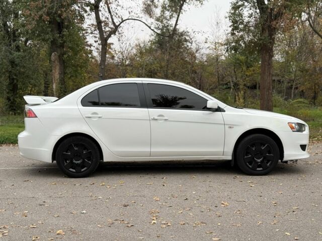 Белый Мицубиси Лансер, объемом двигателя 1.5 л и пробегом 265 тыс. км за 5600 $, фото 4 на Automoto.ua