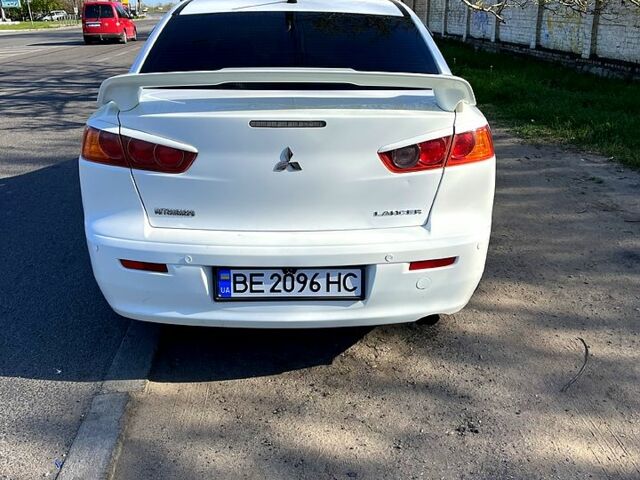 Белый Мицубиси Лансер, объемом двигателя 2 л и пробегом 230 тыс. км за 6700 $, фото 2 на Automoto.ua