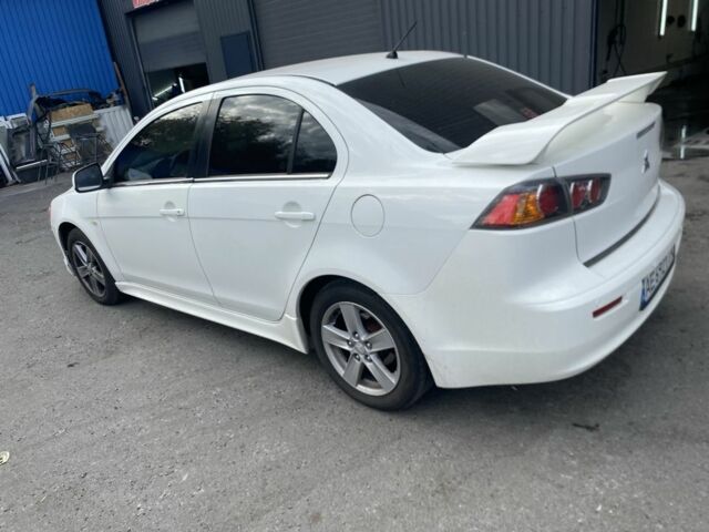 Білий Міцубісі Lancer, об'ємом двигуна 2 л та пробігом 3 тис. км за 6500 $, фото 3 на Automoto.ua