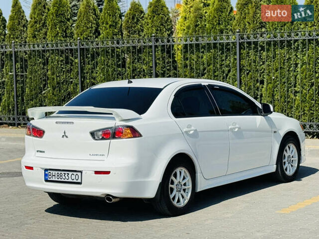Білий Міцубісі Lancer, об'ємом двигуна 2 л та пробігом 163 тис. км за 6500 $, фото 14 на Automoto.ua