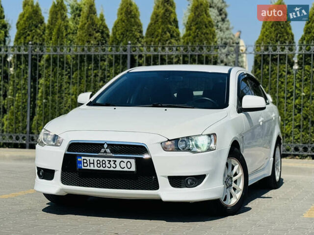 Білий Міцубісі Lancer, об'ємом двигуна 2 л та пробігом 163 тис. км за 6500 $, фото 1 на Automoto.ua
