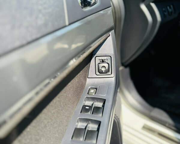 Білий Міцубісі Lancer, об'ємом двигуна 2 л та пробігом 163 тис. км за 6500 $, фото 24 на Automoto.ua