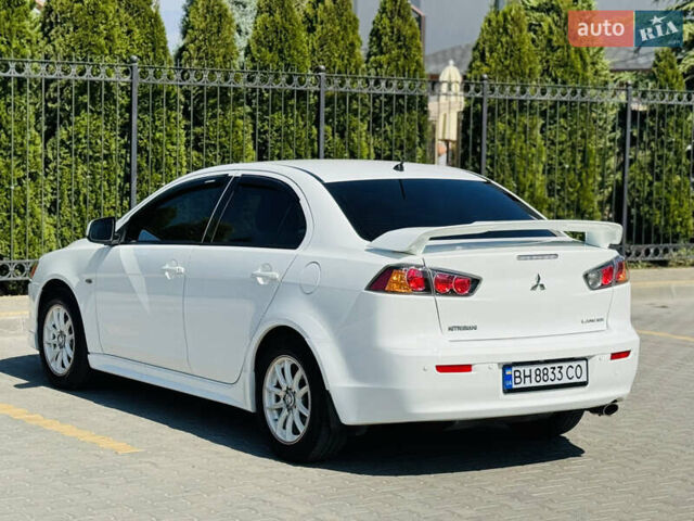 Білий Міцубісі Lancer, об'ємом двигуна 2 л та пробігом 163 тис. км за 6500 $, фото 11 на Automoto.ua