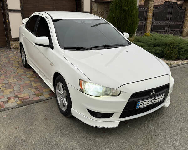 Білий Міцубісі Lancer, об'ємом двигуна 2 л та пробігом 269 тис. км за 6000 $, фото 11 на Automoto.ua