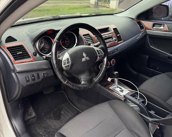 Білий Міцубісі Lancer, об'ємом двигуна 2 л та пробігом 269 тис. км за 6000 $, фото 12 на Automoto.ua