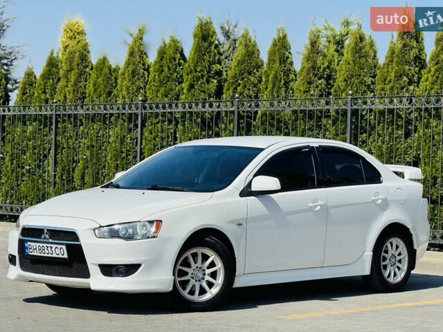 Білий Міцубісі Lancer, об'ємом двигуна 2 л та пробігом 163 тис. км за 6500 $, фото 2 на Automoto.ua